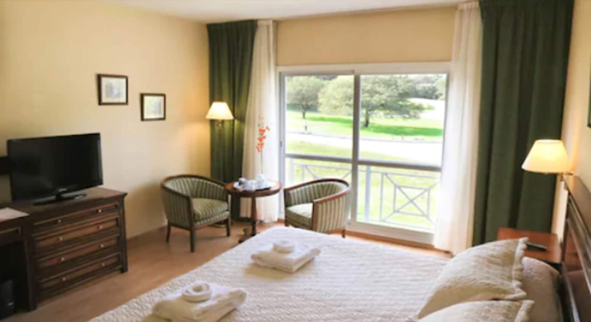 Howard Johnson Hotel & Spa Villa General Belgrano Bagian luar foto